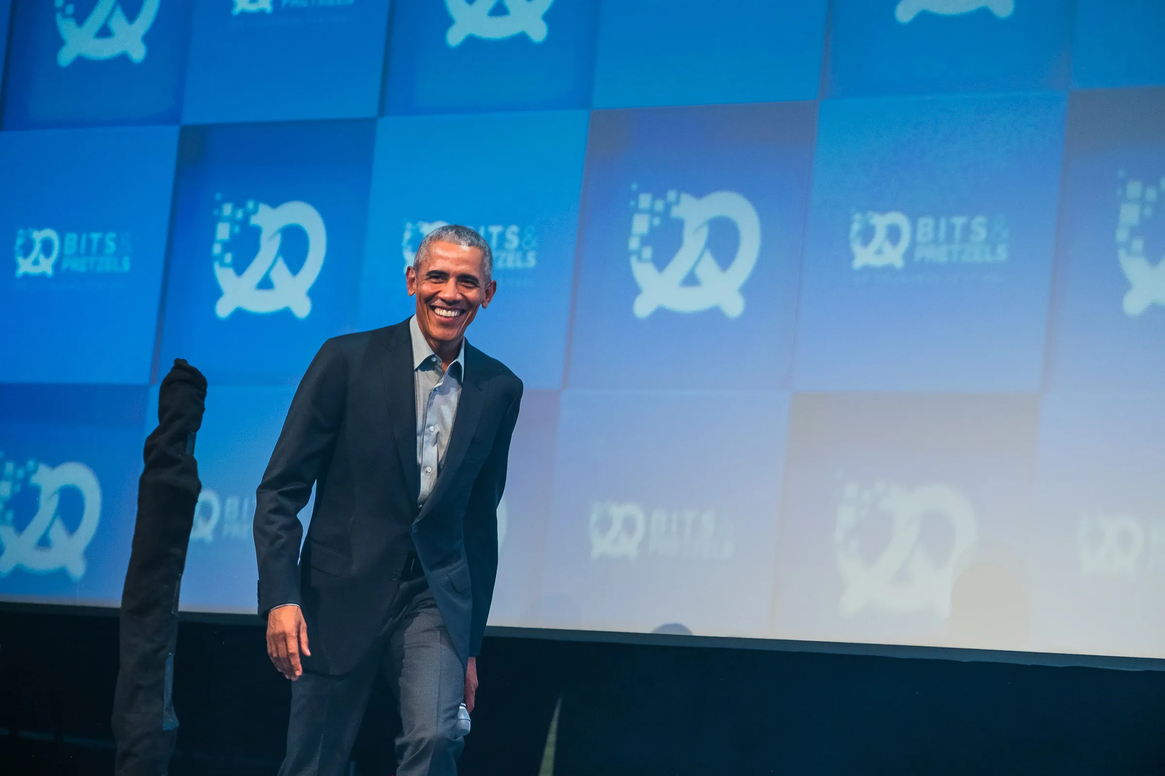 Bits & Pretzels 2019 - President Obama walking on stage, microphone in hand