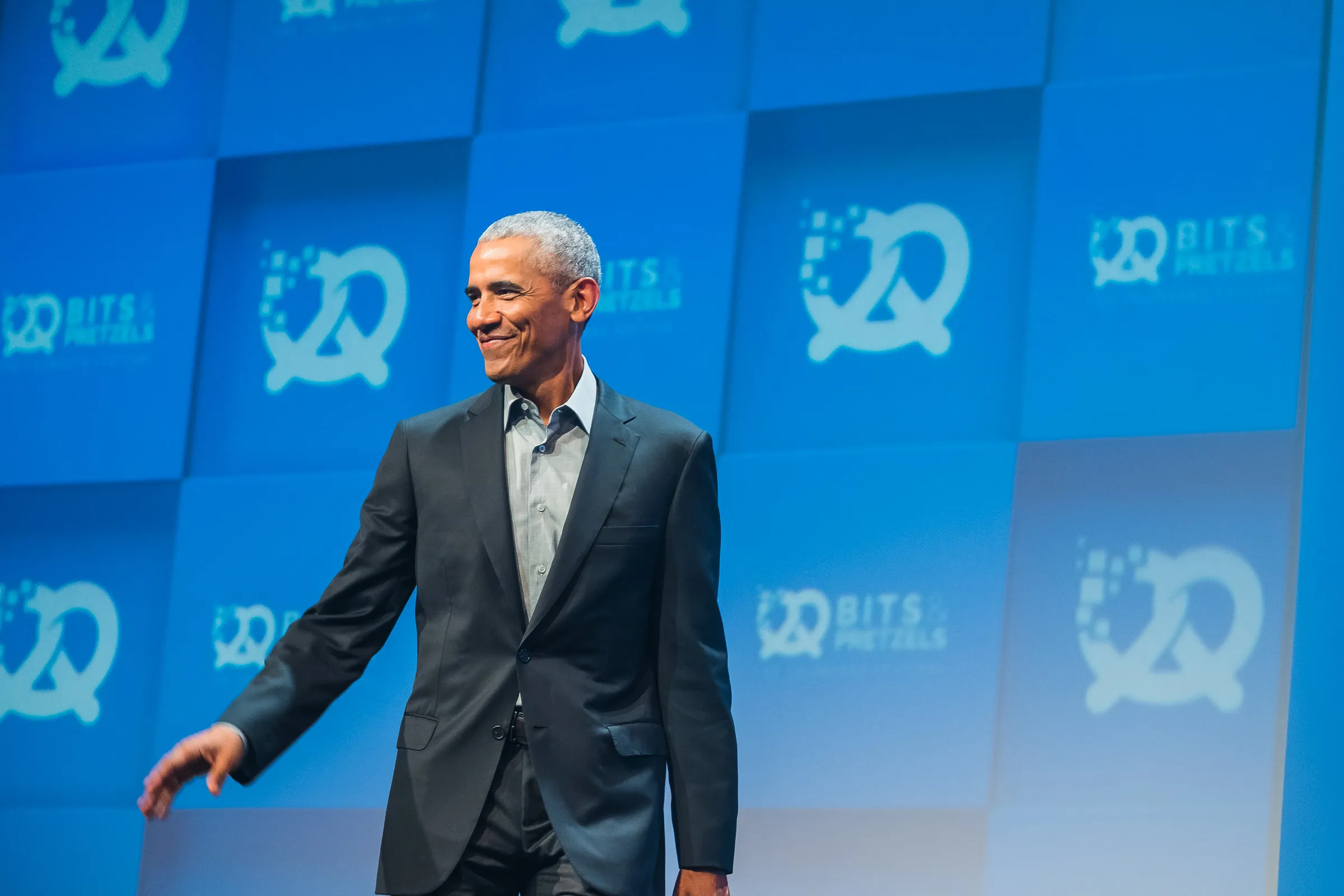 Bits & Pretzels 2019 - President Obama smiling as he crosses the stage
