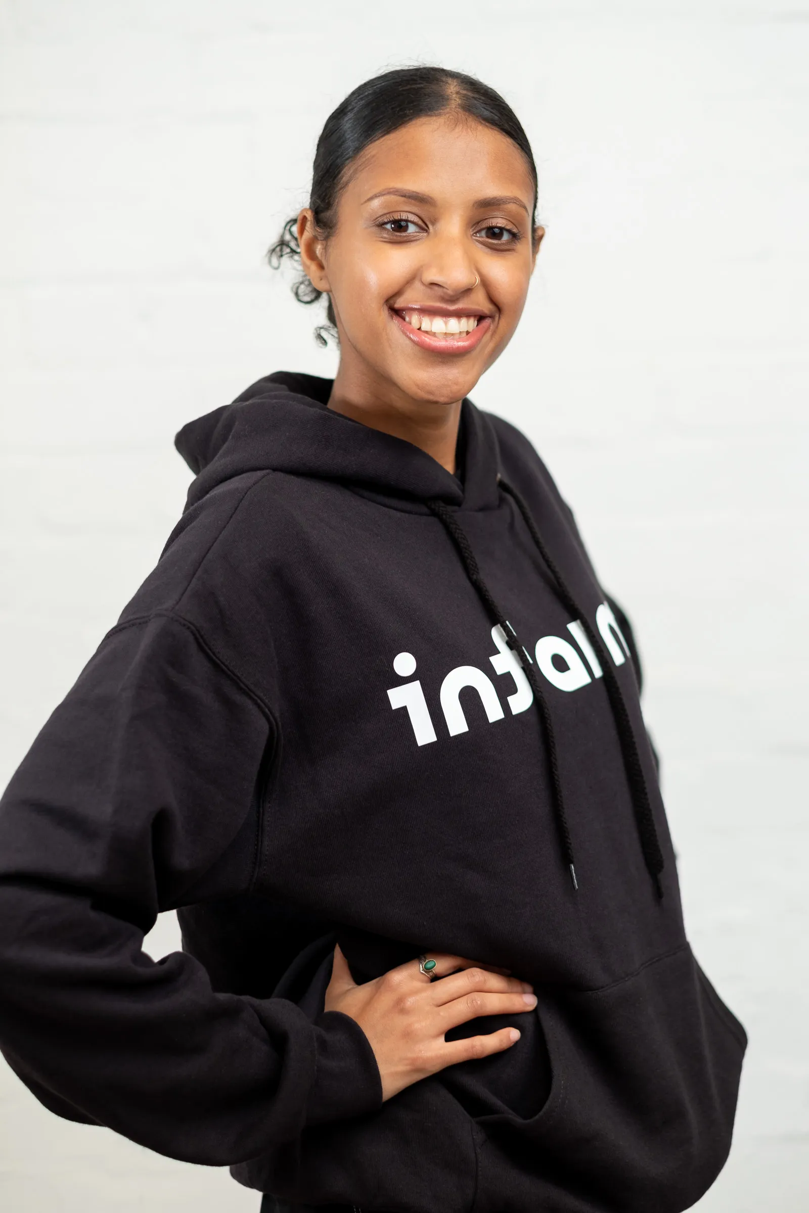 Infarm London Team Photography - Studio headshot, branded Infarm hoodie