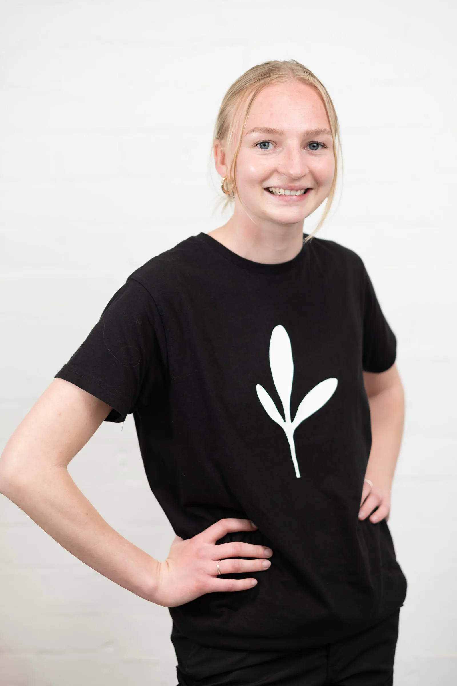 Infarm London Team Photography - Studio headshot, branded Infarm leaf t-shirt