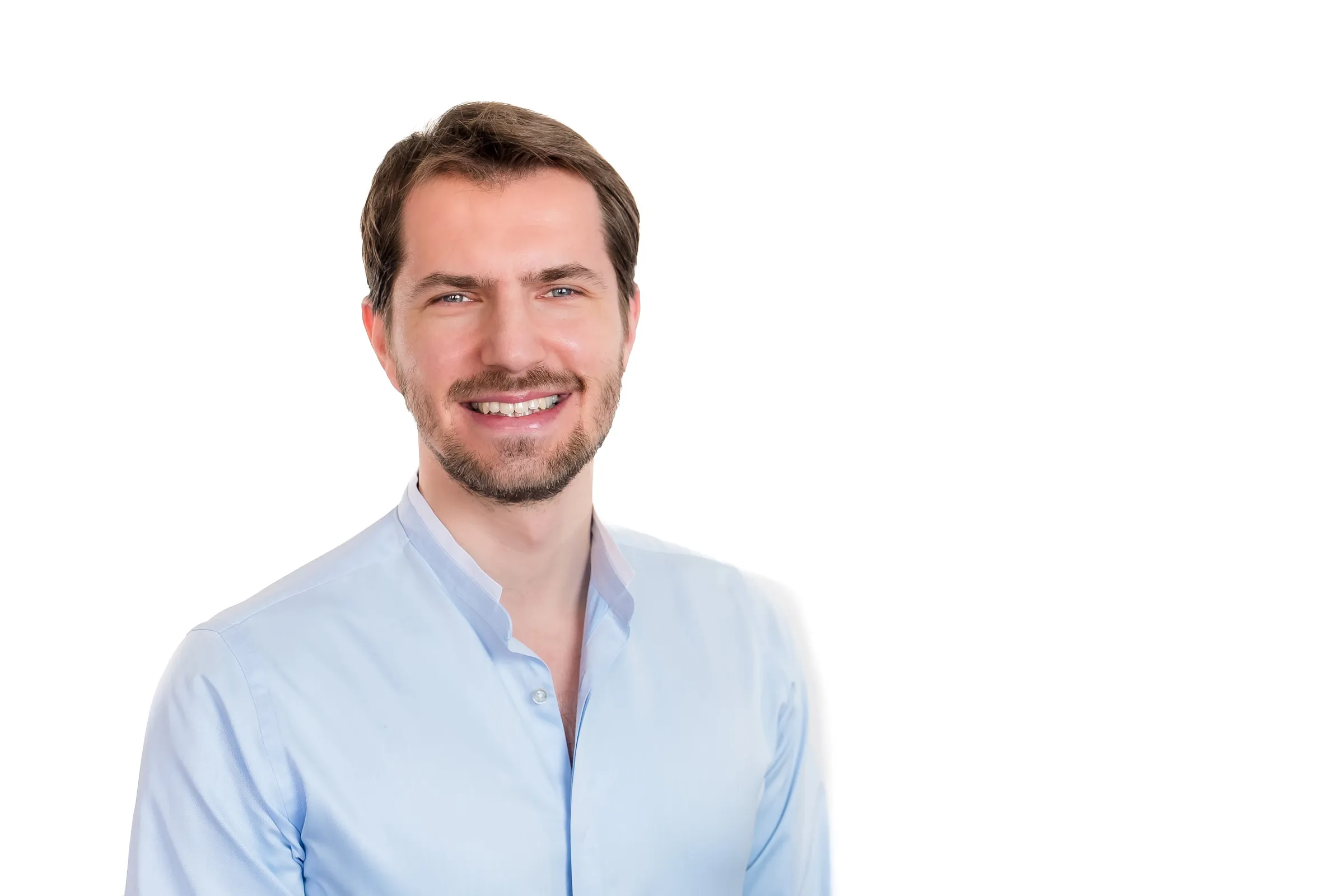 Martin Rajcan Headshots - Portrait against white backdrop, alternate expression