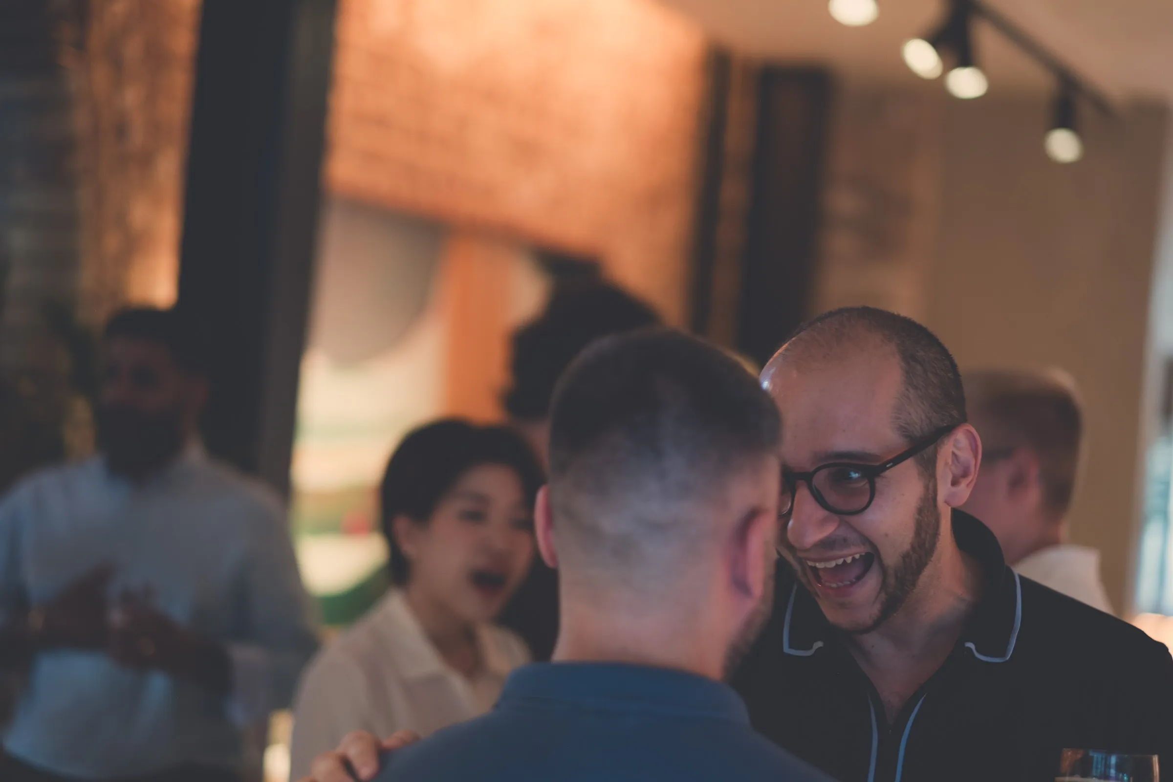 Planet A Ventures London Dinner - Candid networking, mid-conversation laughter